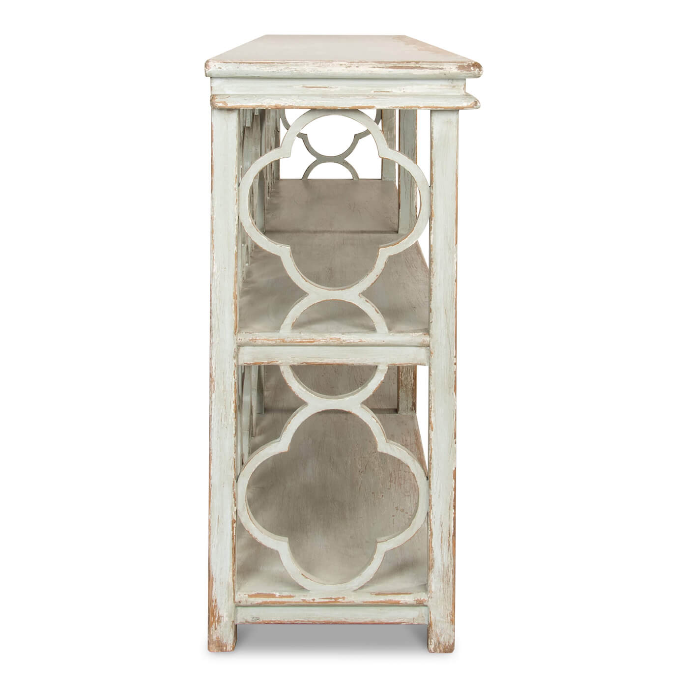Side panel design of country painted quatrefoil bookcase.
