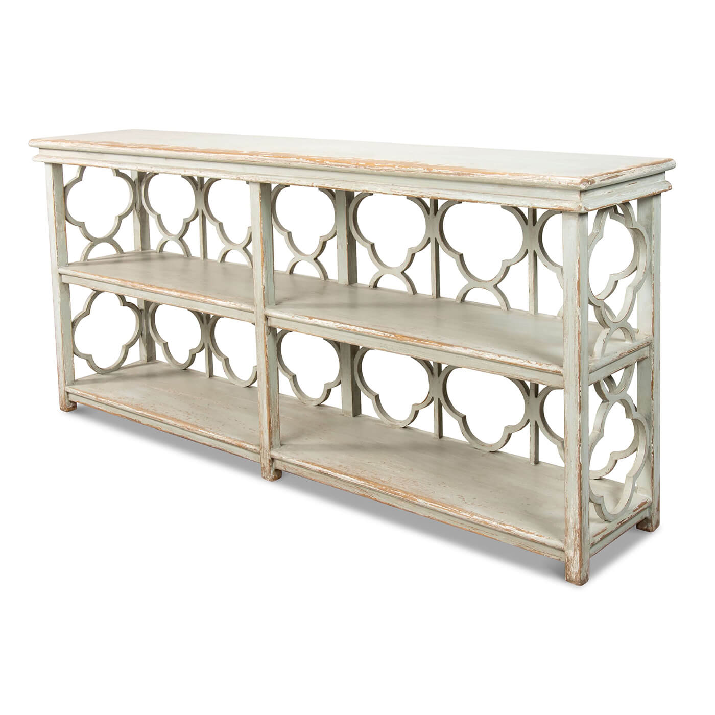 Side view of country painted quatrefoil bookcase.