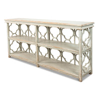 Side view of country painted quatrefoil bookcase.
