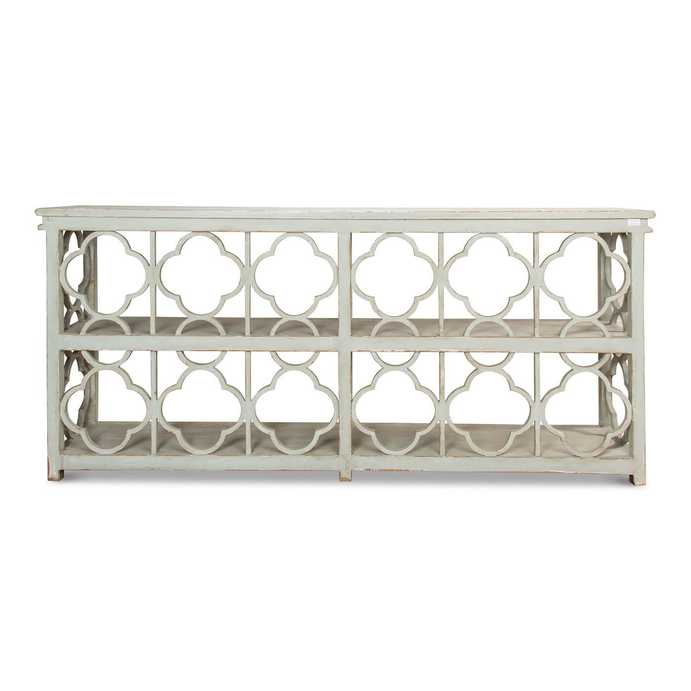 Back view of country painted quatrefoil bookcase.