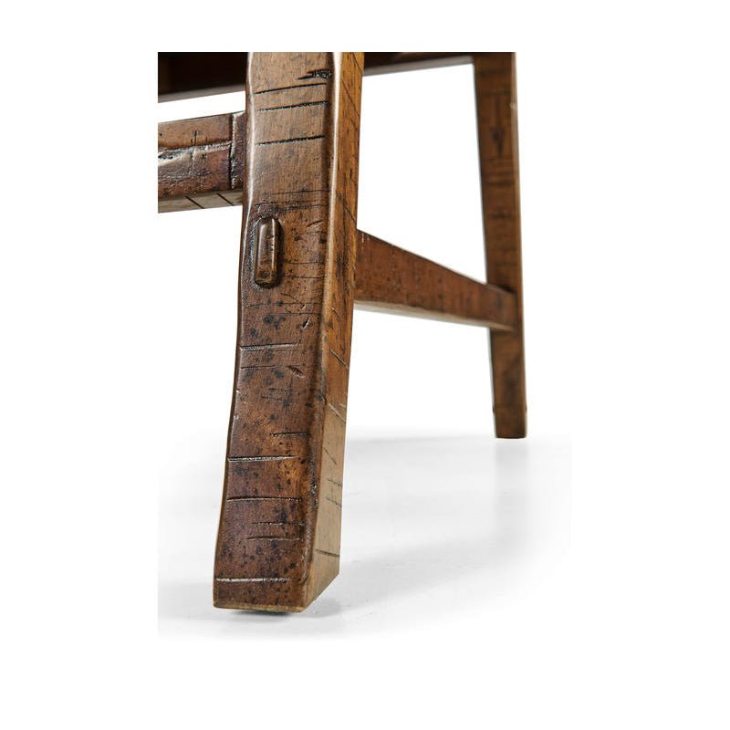 Close-up detail of country rustic dining chair leg.