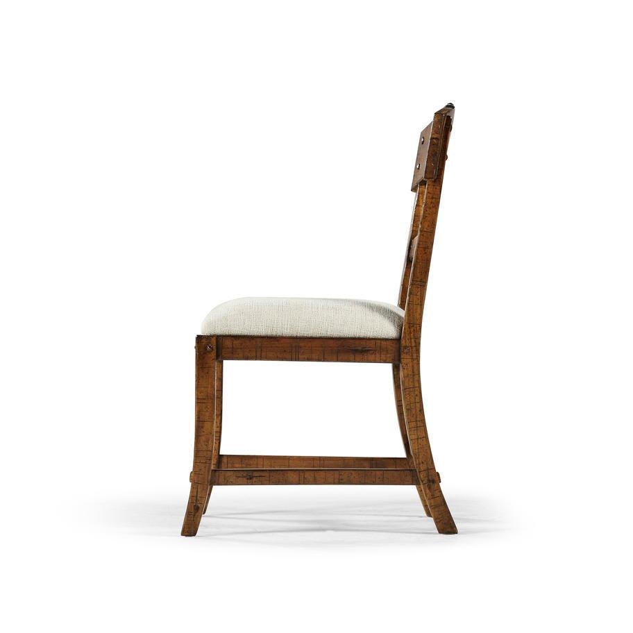 Side view of a country rustic dining chair.