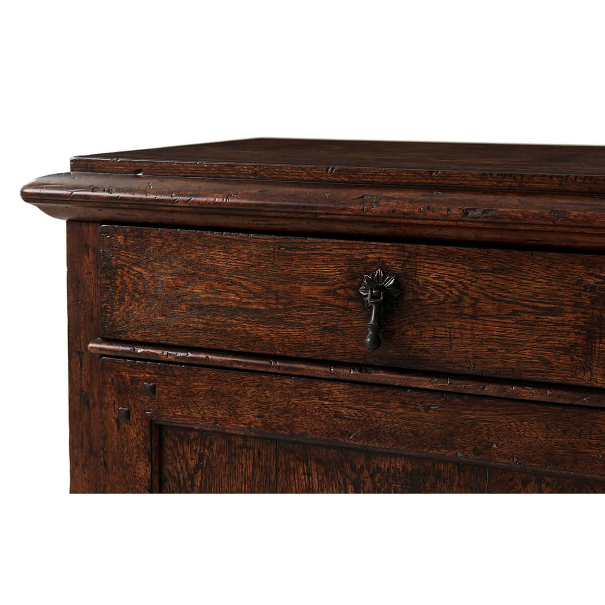 Close-up of drawer handle, rustic oak bedside table.
