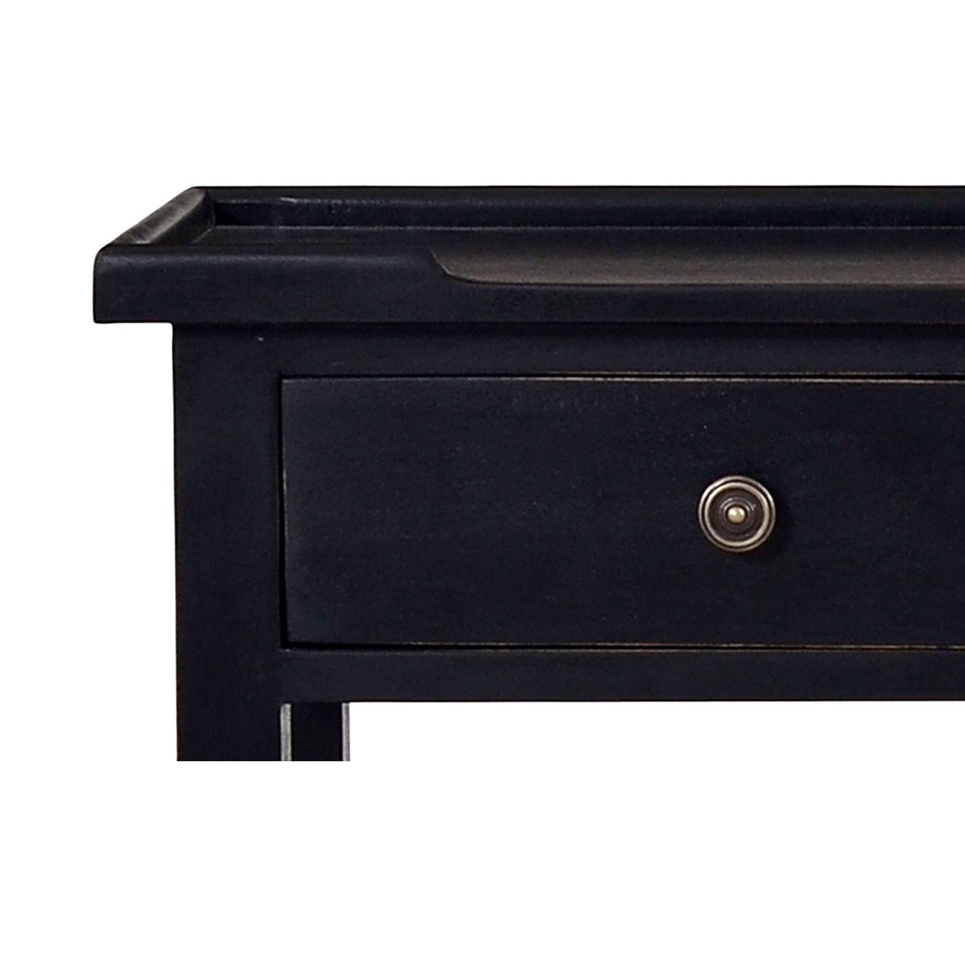 Close-up of black console table drawer handle.