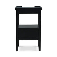 Black side table, rear view showing structure and design.