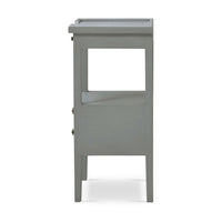Side view of gray side table, showing slim profile.