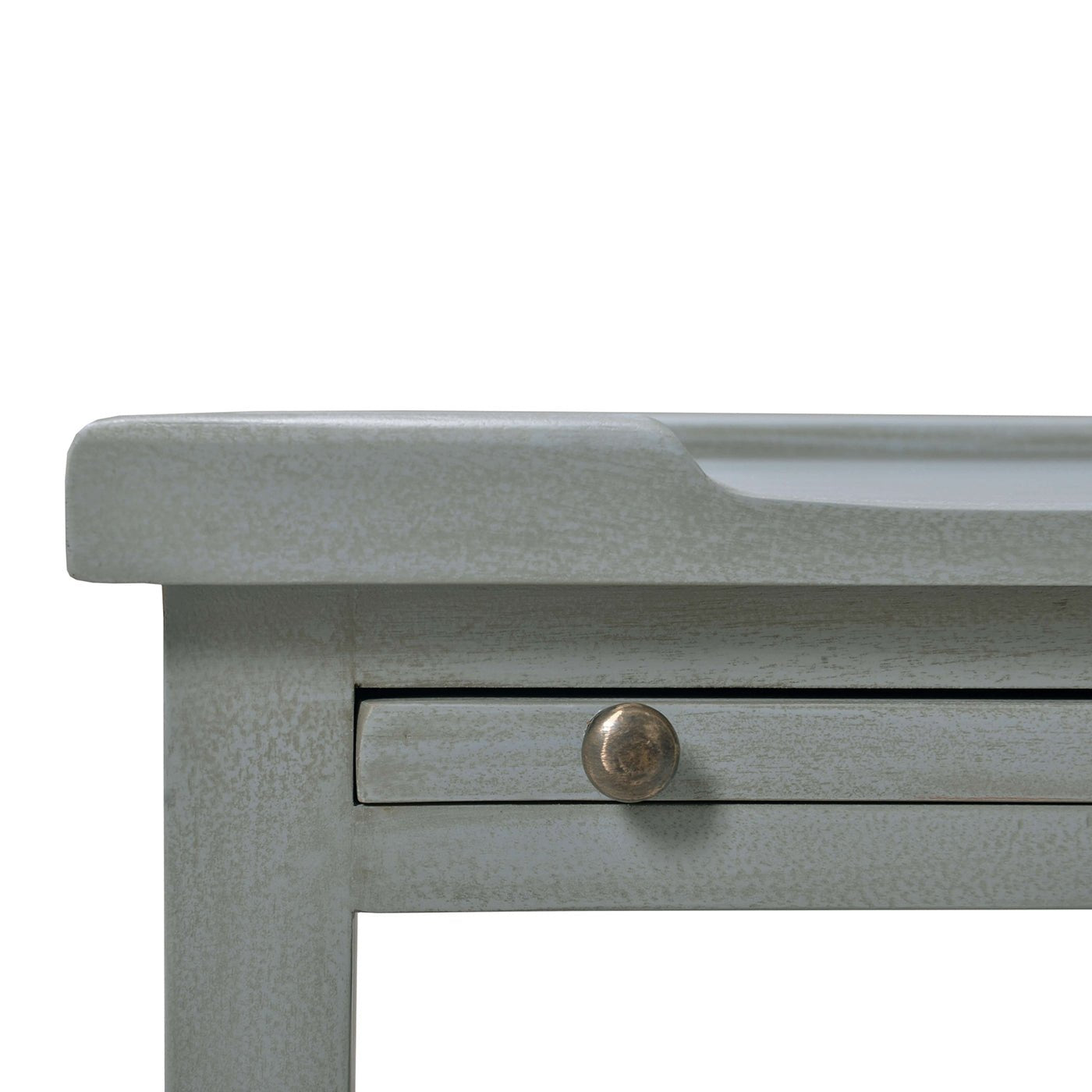 Close-up of side table’s top edge detail.