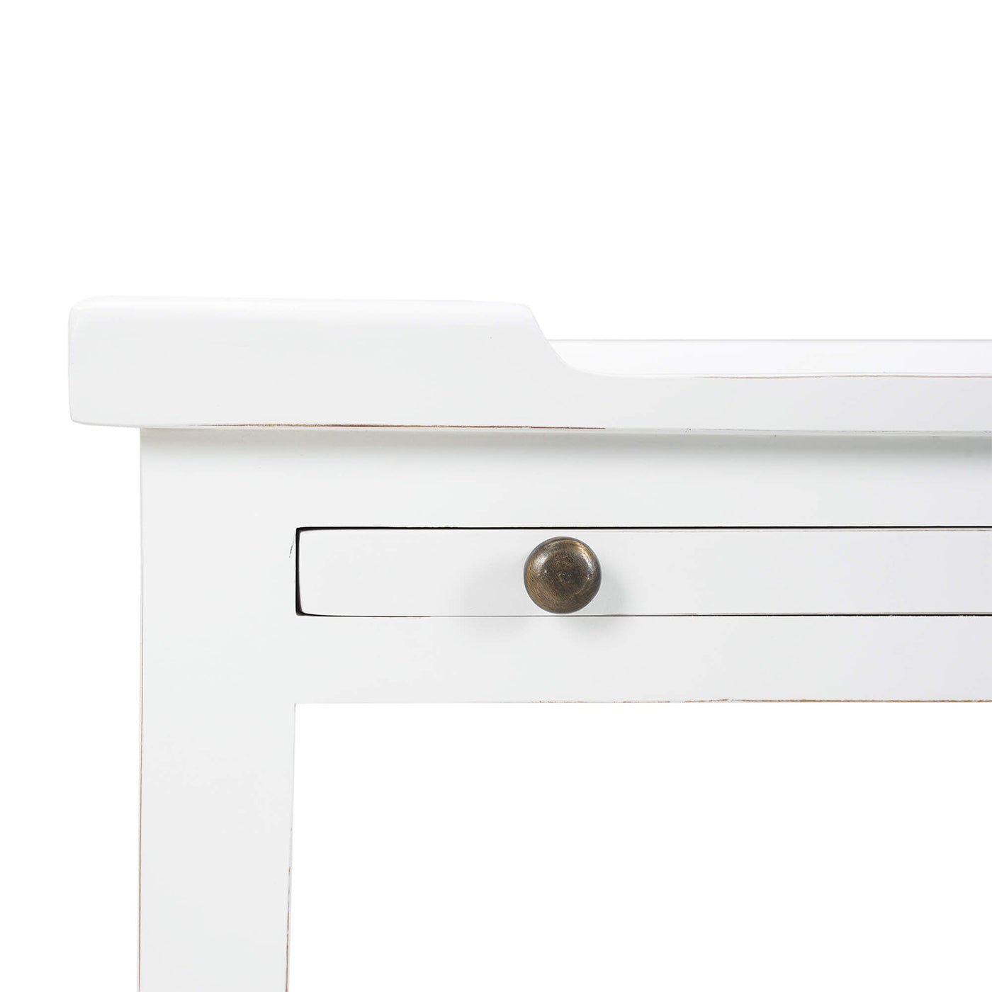 Close-up of white table, top edge detail.