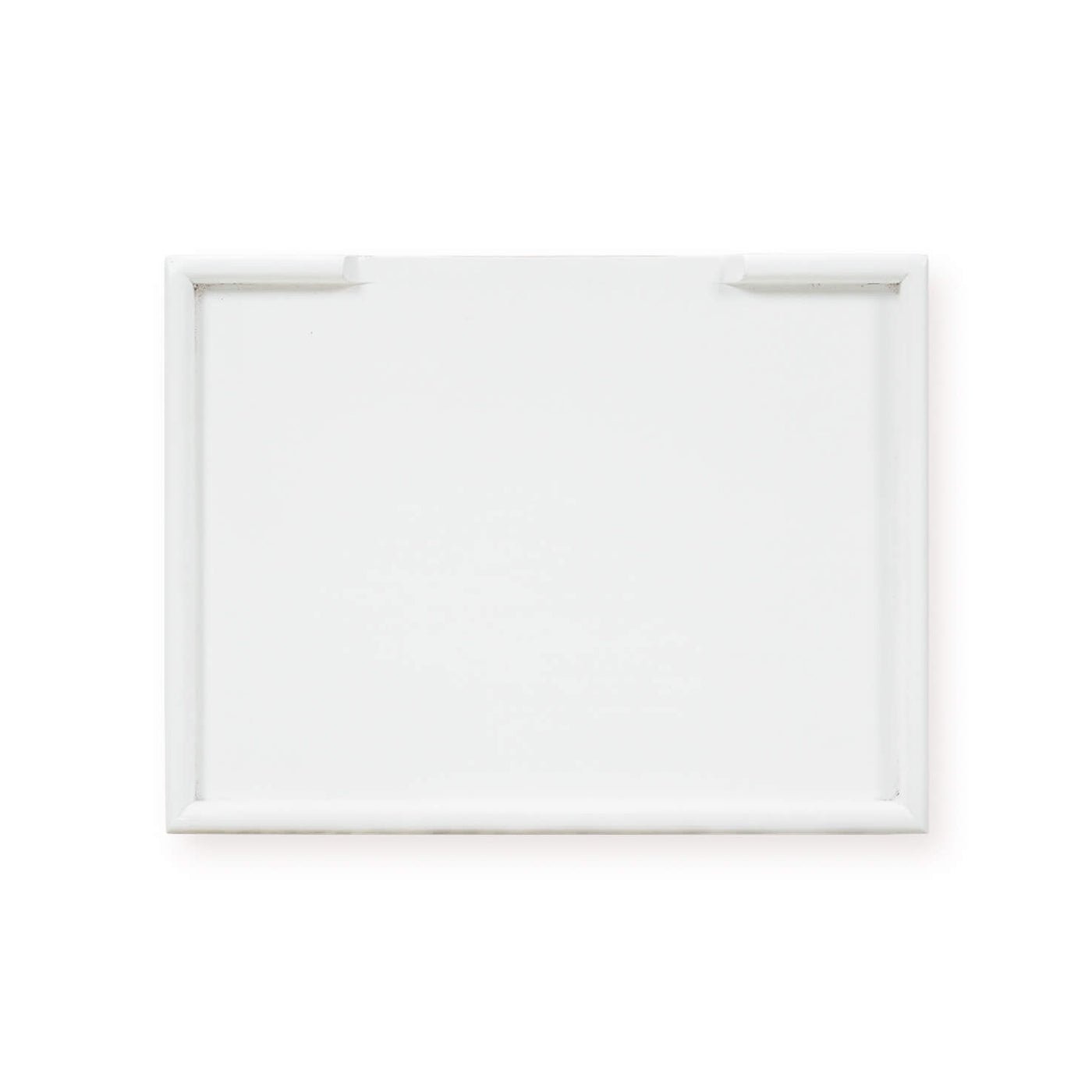 White side table, top view.