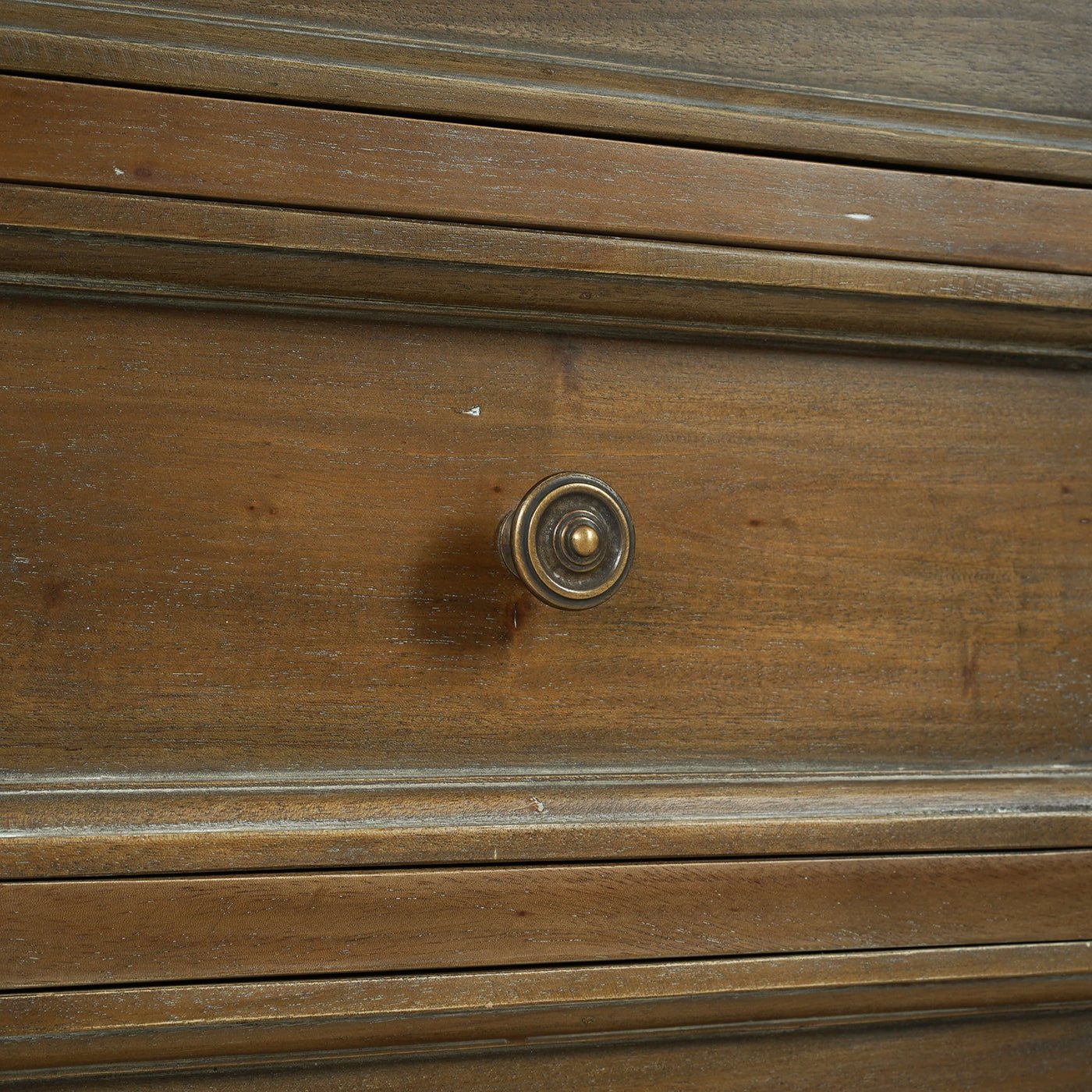 Close-up of end table drawer knob detail.