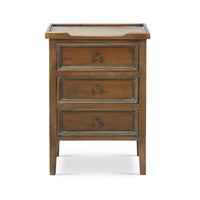 Front view of wooden three-drawer end table.