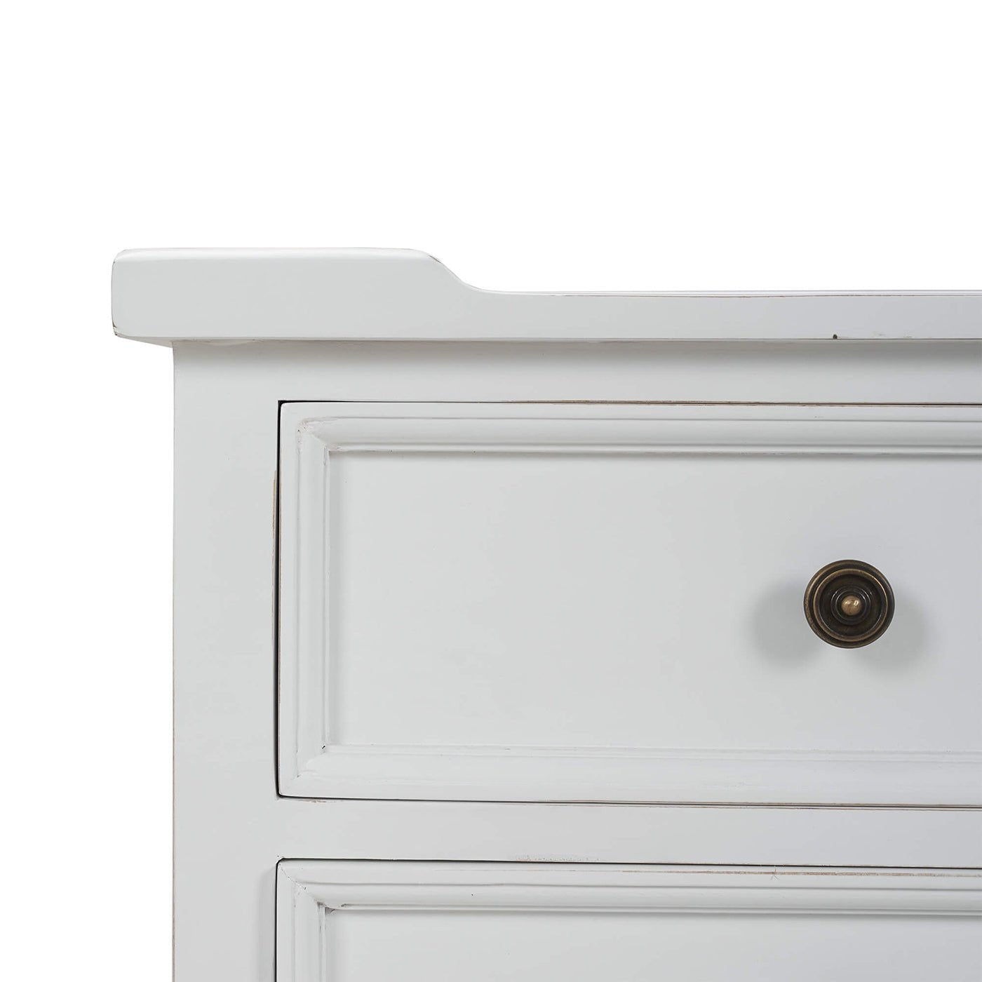 Close-up of upper drawers on white end table.