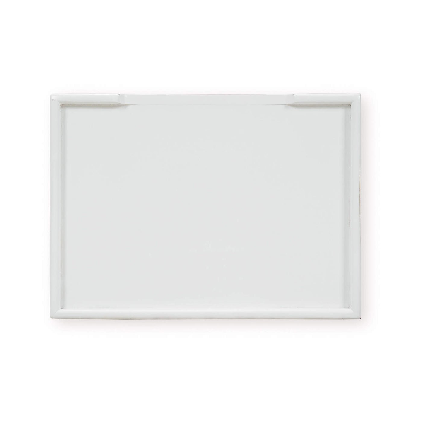 Top view of white end table, flat surface.