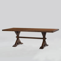 Trestle dining table side view showing structure.