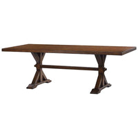 Wooden trestle dining table angled view.