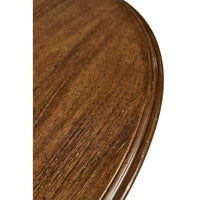 Detailed view of demilune console table surface texture.