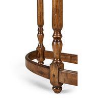 Leg and base close-up of demilune console table.