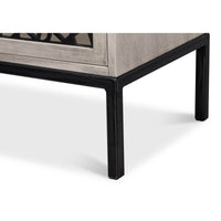 Close-up of Covet Credenza metal leg, sturdy construction.