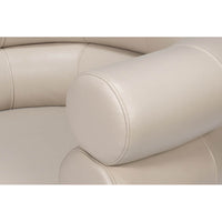 Arm and cushion details on leather accent chair.