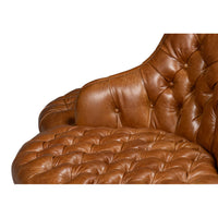 Sofa backrest with tufted leather pattern.