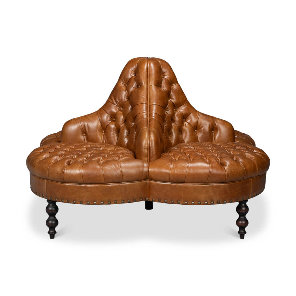 Brown sofa with tufted detail, front angle.
