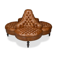 Vintage-style lobby sofa, side angle view.
