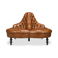 Upholstered lobby sofa, centered view.