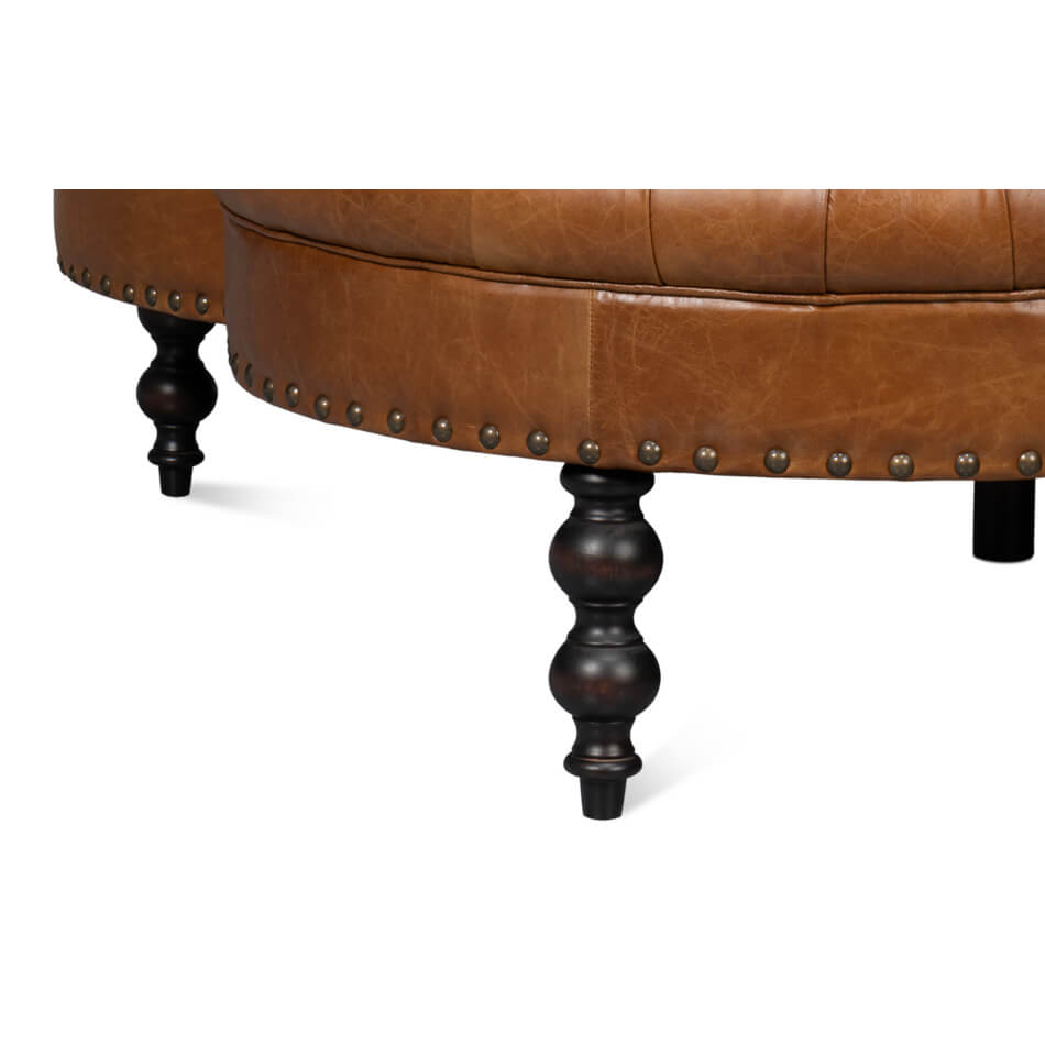 Dark wooden legs of lobby sofa, close-up.