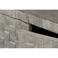 Detailed shot of Cubist sideboard corner and texture.