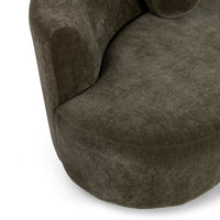 Close-up of olive green sectional showing the rounded seat edge and curved back