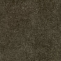 Close-up of olive green sectional upholstery showing the mottled fabric texture