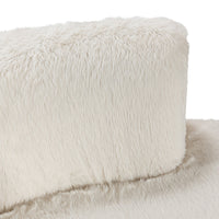 Close-up of the cream sectional back showing its rounded edge and long plush fibers