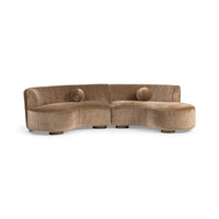 Straight-on front view of brown curved sectional showing its two joined sections and round pillows