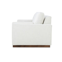 Side view of white Art Deco style sofa