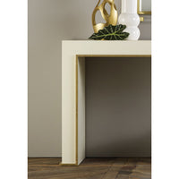 Close-up of white console table corner and decor