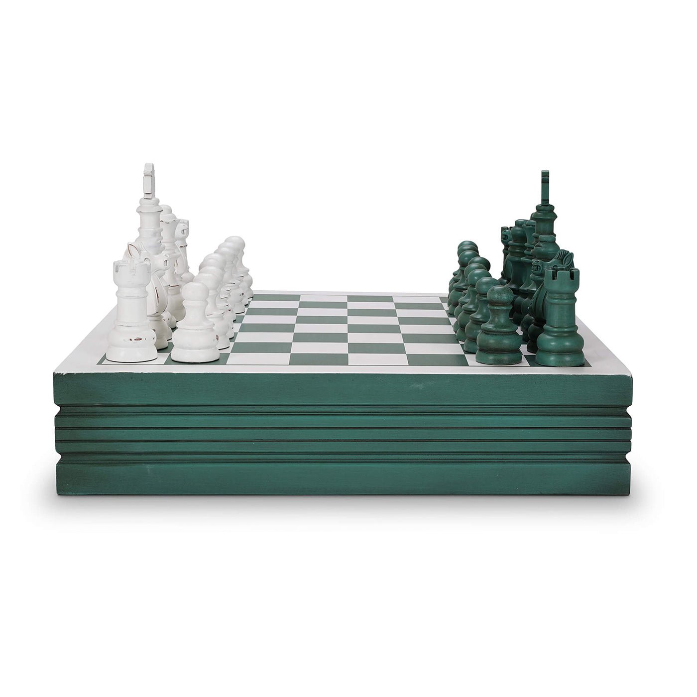 Side view of chess board set with green accents.