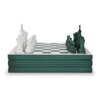 Side view of chess board set with green accents.