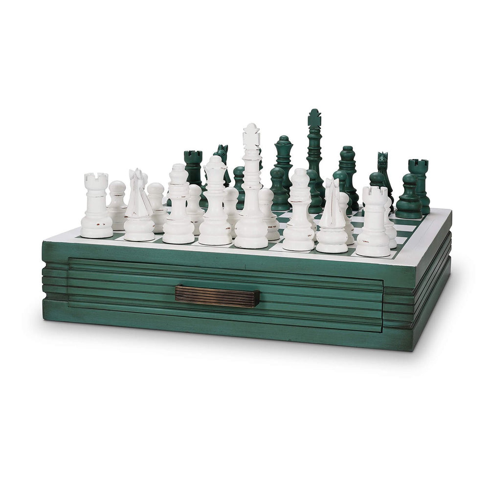 Green wooden chess board with white and green pieces.
