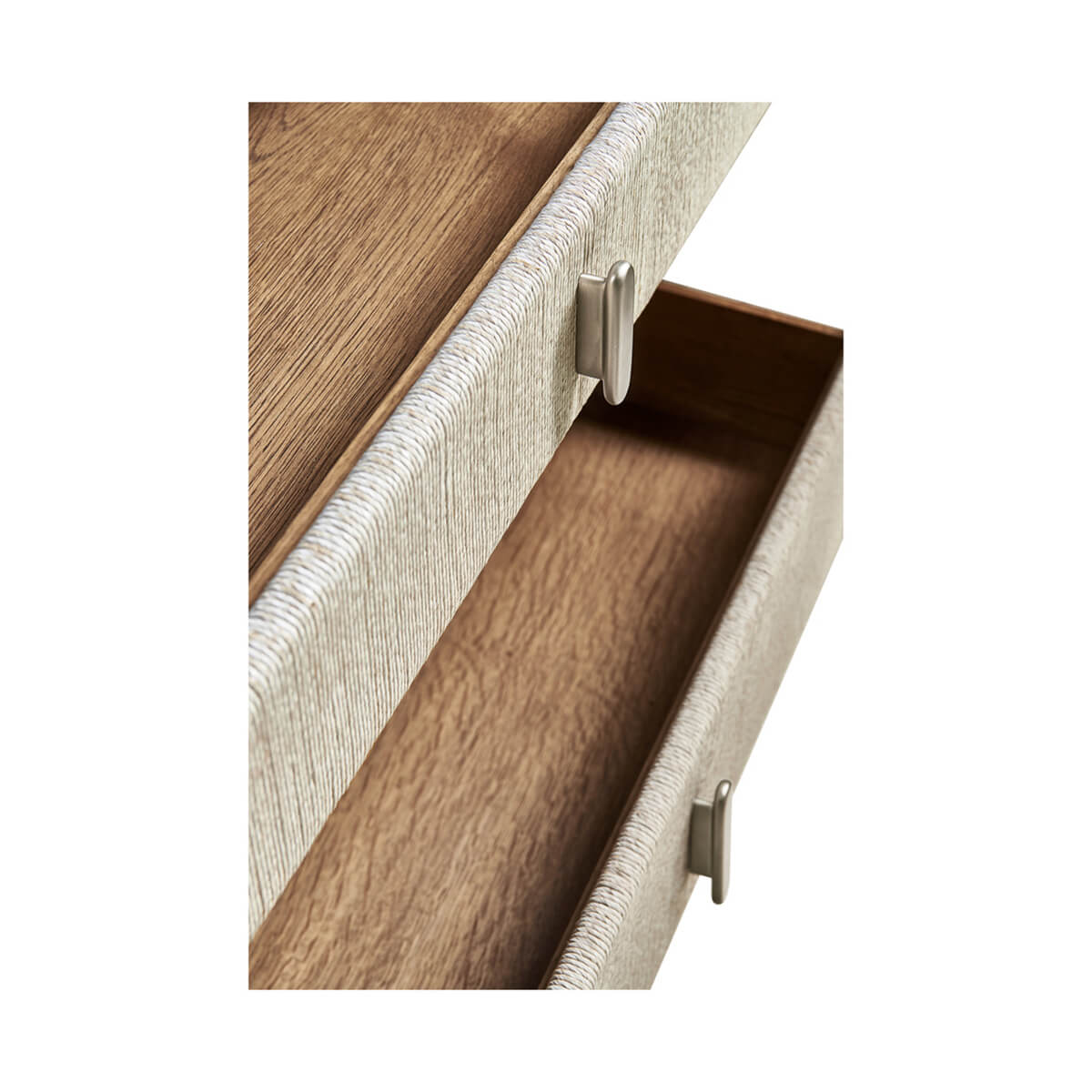 Open drawers of Danish cord nightstand, interior view.