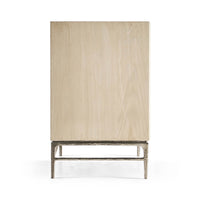 Side view of Danish cord nightstand on metal frame.