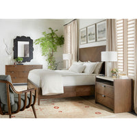 Dark ash dresser in bedroom setting with bed and decor.
