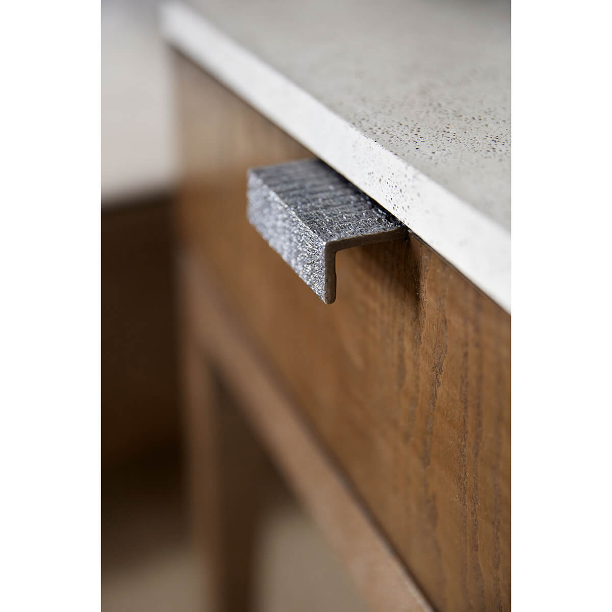 Dark ash nightstand, close-up of drawer handle detail.