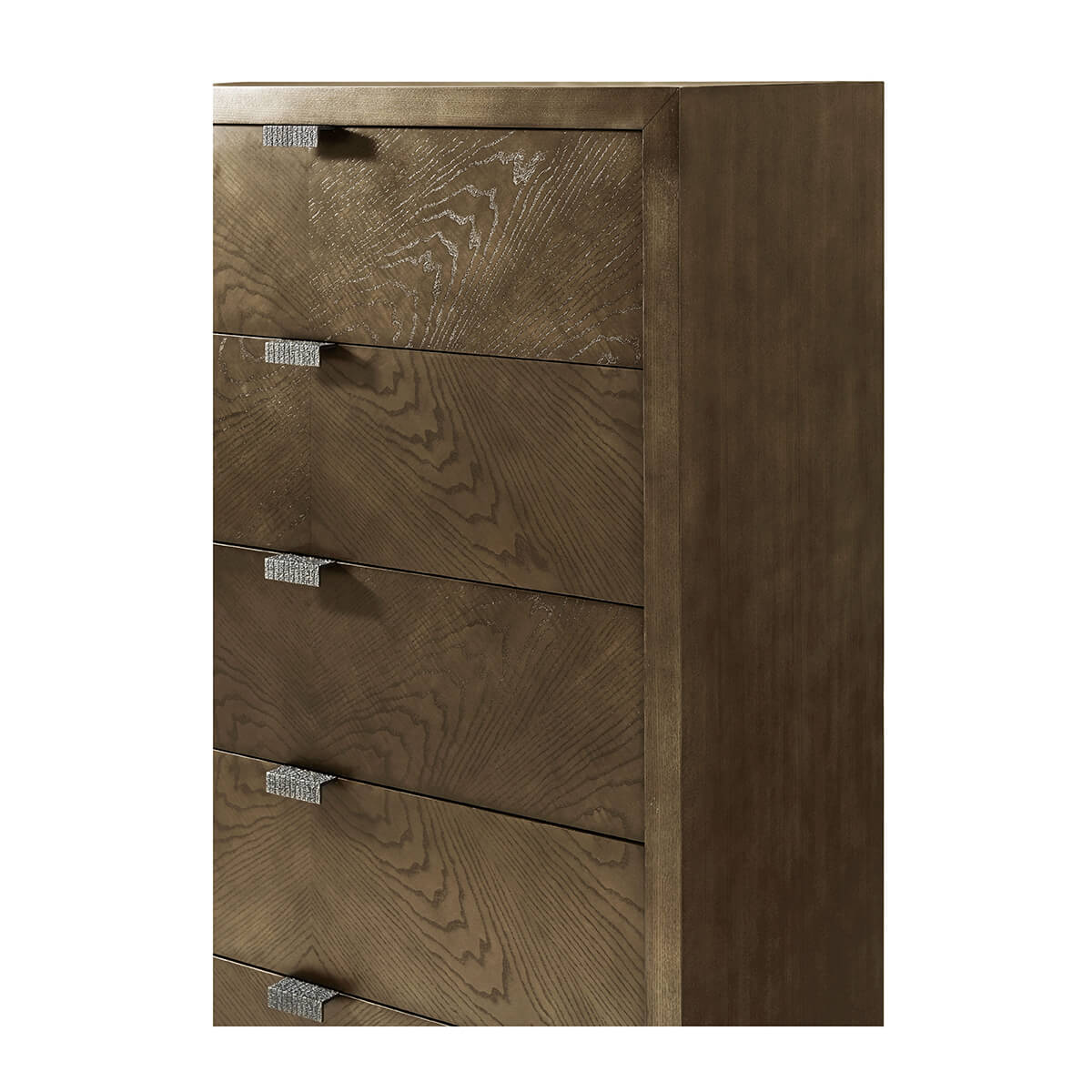 Close-up, drawer detail on dark ash chest.