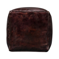 Side view of dark brown leather cube stool.
