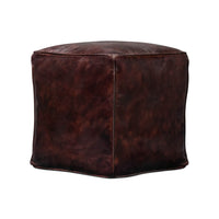 Angled lower view of leather cube stool.