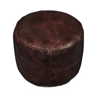 Dark brown round stool from above.