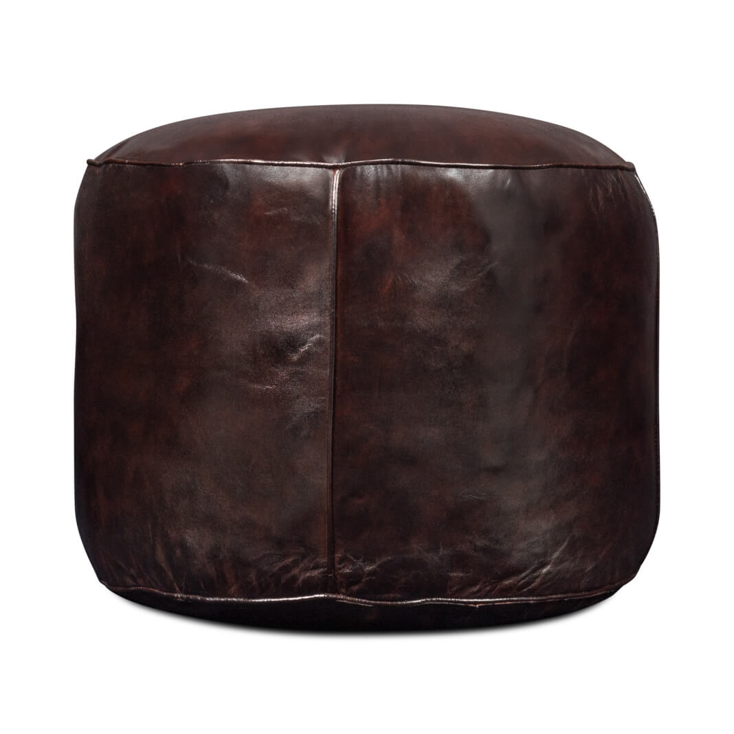 Side angle of leather stool with texture detail.