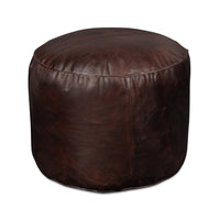 Round leather stool side perspective.