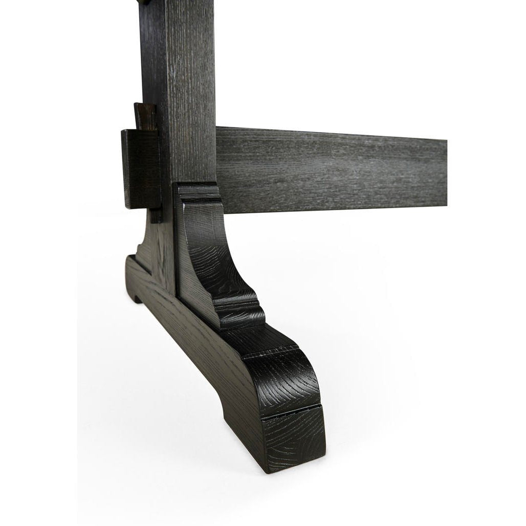 Dining table leg, focus on intricate woodwork.