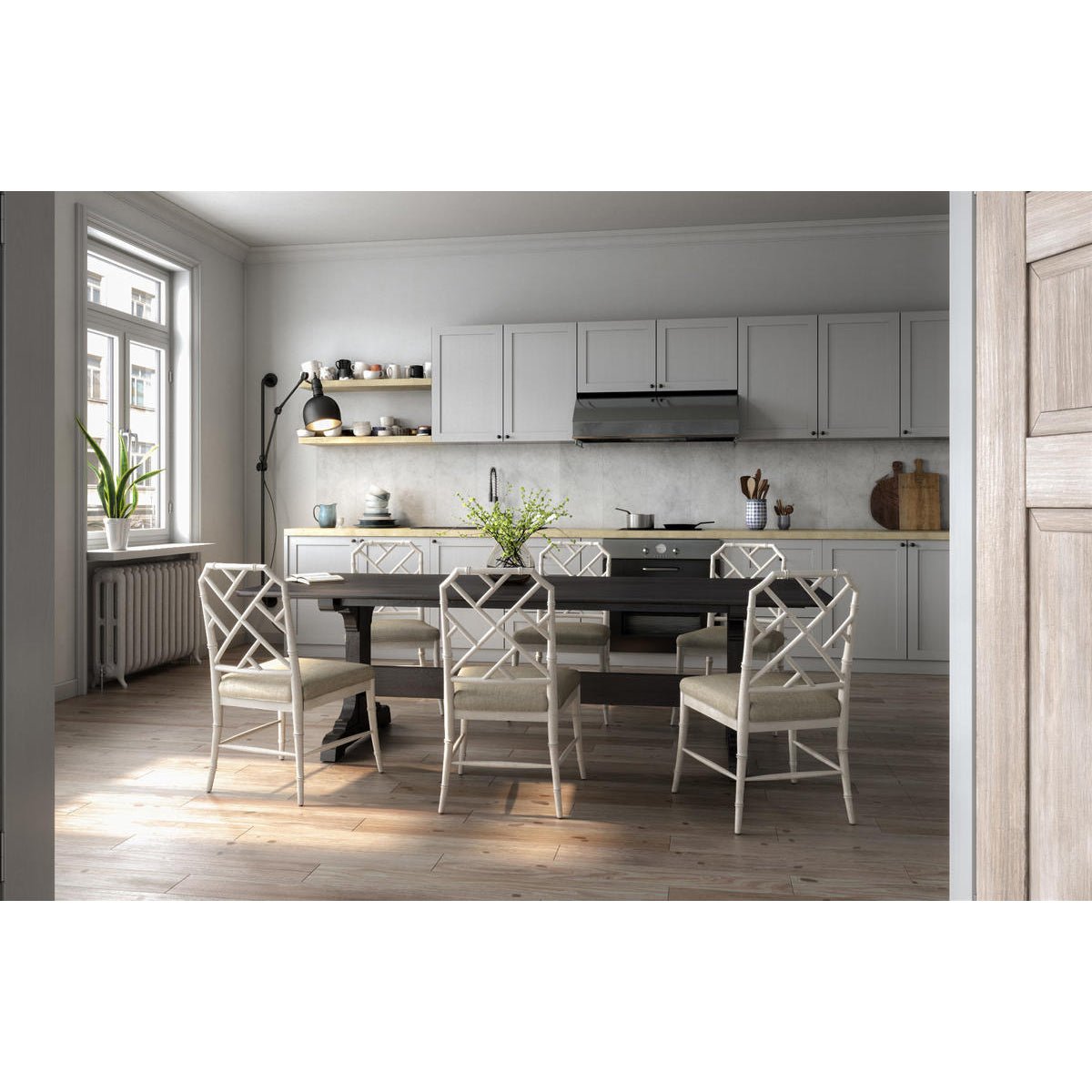 Dining table styled in modern kitchen setting.